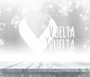 Logo de Vuelta y Vuelta rodeado de nieve