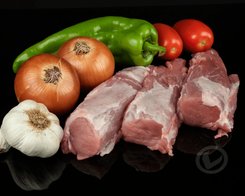 solomillo de cerdo Vuelta y Vuelta, con algunas verduras