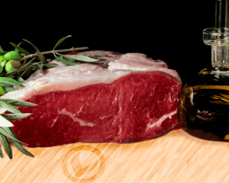 Trozo de lomo bajo para roast beef de Vuelta y Vuelta, sobre una tabla de madera